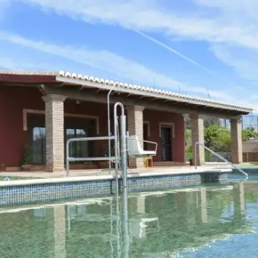 The pool has a hoist to access